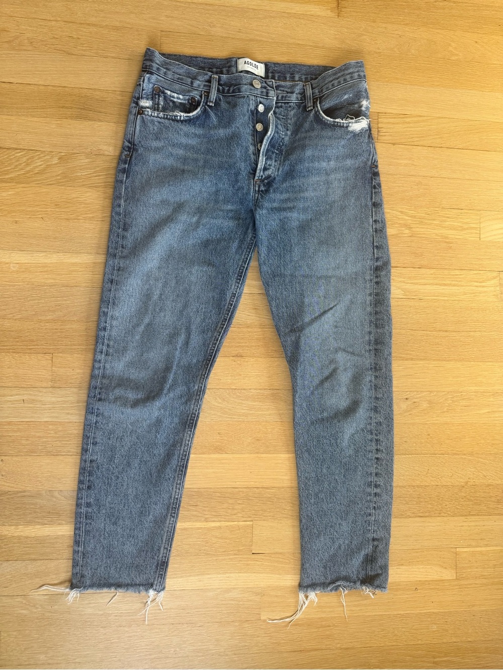 Agolde High-Rise Women's Jeans in Faded Blue with Raw Hem